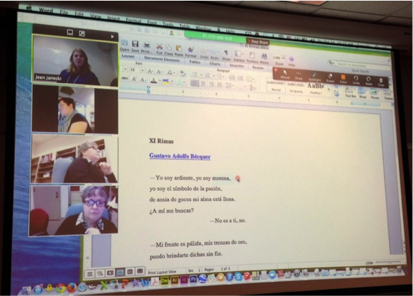 Computer screen of Zoom video chat with multiple participants.