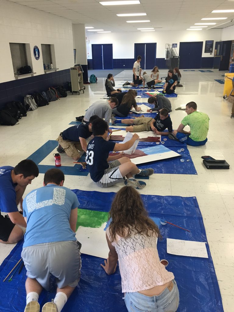 Students at Prospect High School creating mural.