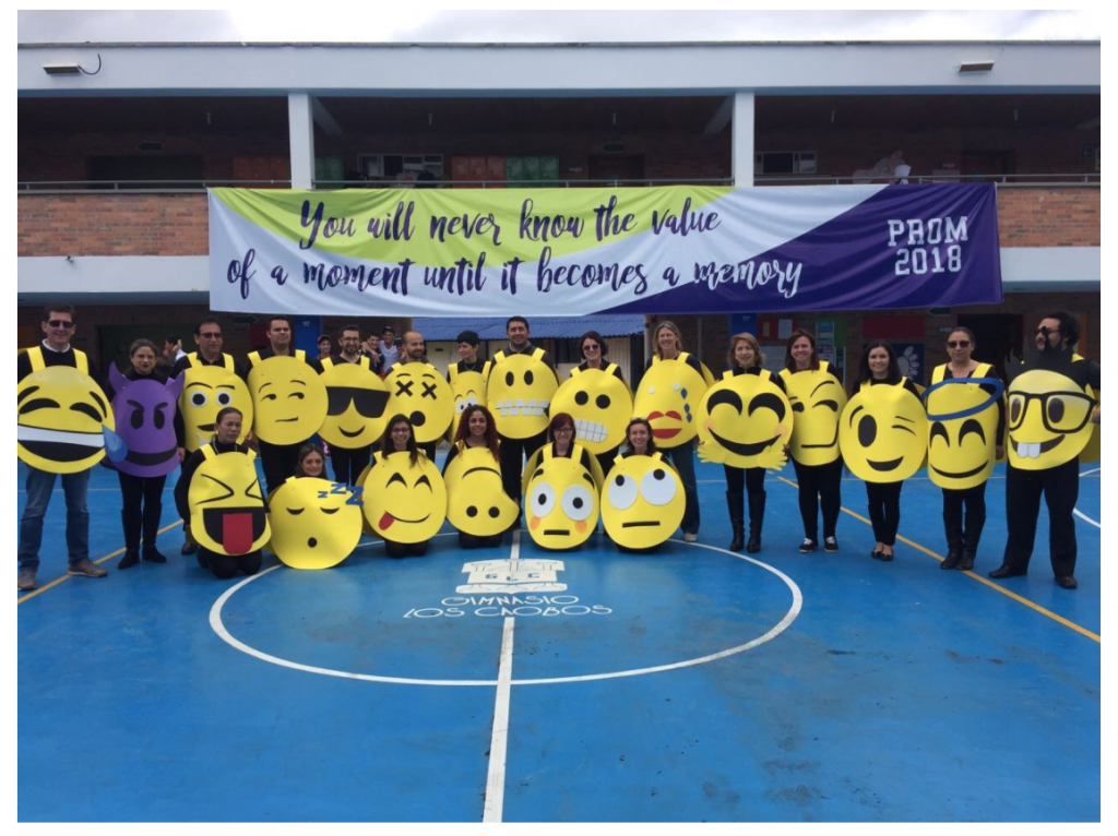 Gimnasio Los Caobos High School faculty dressed as Emojis for Halloween.
