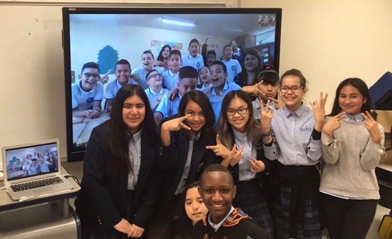 Sixth graders in Dallas, Texas posing for a picture with their peers in Medellin, Colombia after a fun mystery hangout in Spanish 