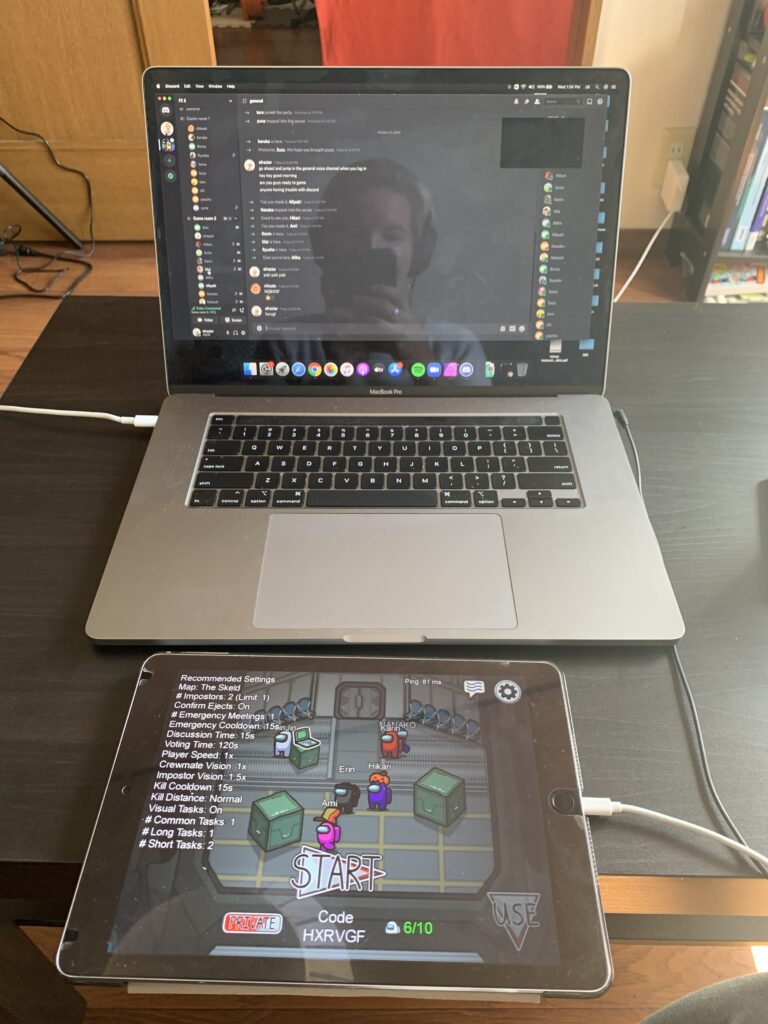 Picture 5: My setup for the lesson with Discord running on my computer and the game on my iPad