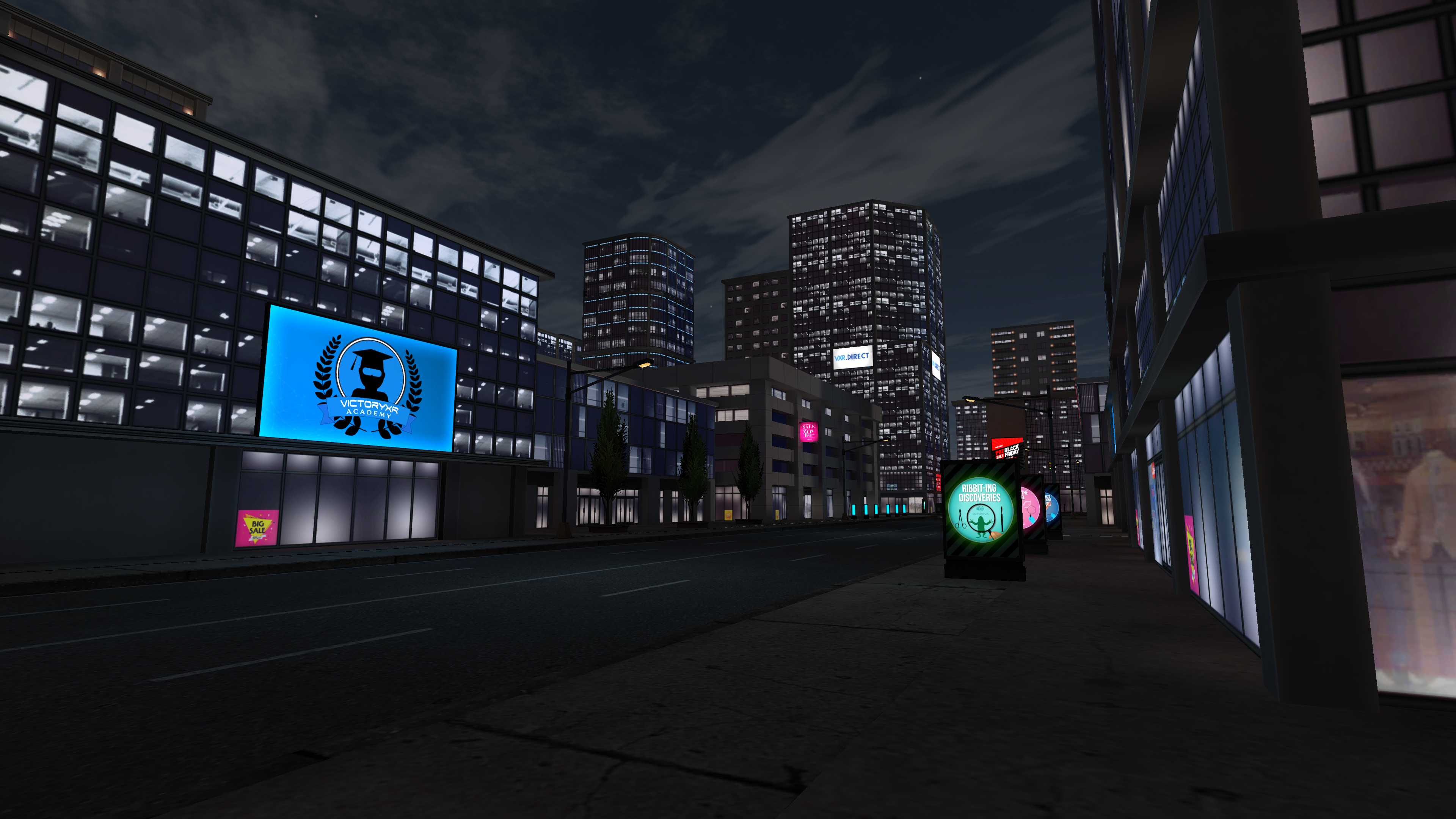 Picture 4 – Lesson 4 Location “A City at Night”, has buildings and lights at night with a screen