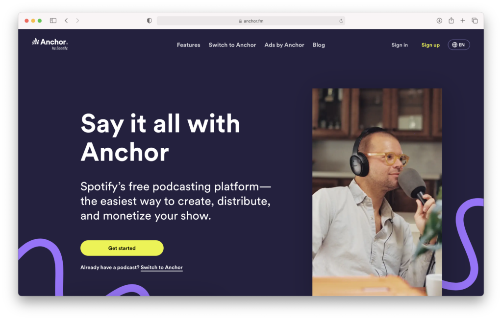 Picture 9 - Anchor home page - Say it all with Anchor - Spotify's free podcasting platform - the easiest way to create, distribute, and monetize your show. Button that says "Get started" and a man with headphones on speaking into a microphone.