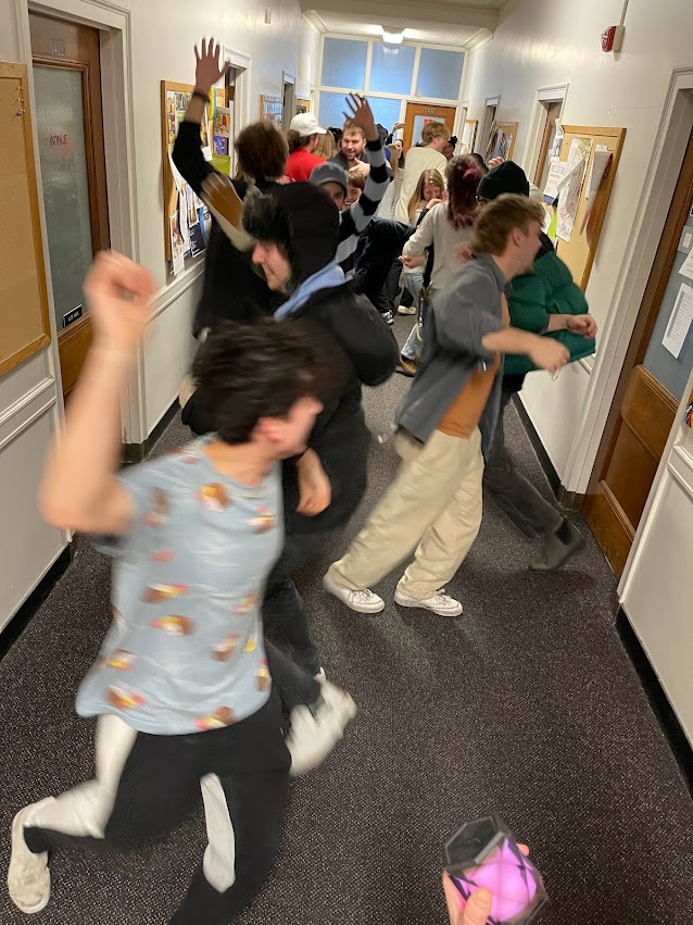 Picture 4 - Students engaging in the hallway