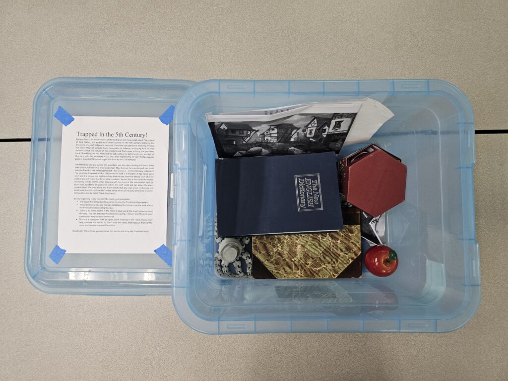Picture 15 - The Game Trapped in the 5th Century Boxed and Ready to Use - a plastic box with instructions and several of the game components in it