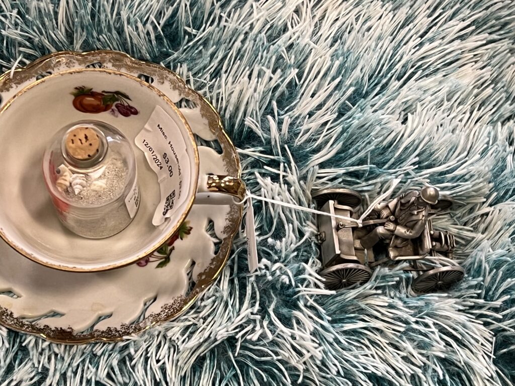 Picture 2 - Detail from an exploration of Kafka’s Der Jäger Gracchus (The Hunter Gracchus). The hunter’s body travels in a teacup barge across a fuzzy blue lake.
