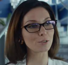 a woman in glasses