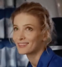 a blond woman in a uniform